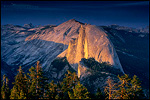 Picture: Sunset light through storm clouds on Half Dome and Clouds Rest from Glacier Point, Yosemite National Park, California